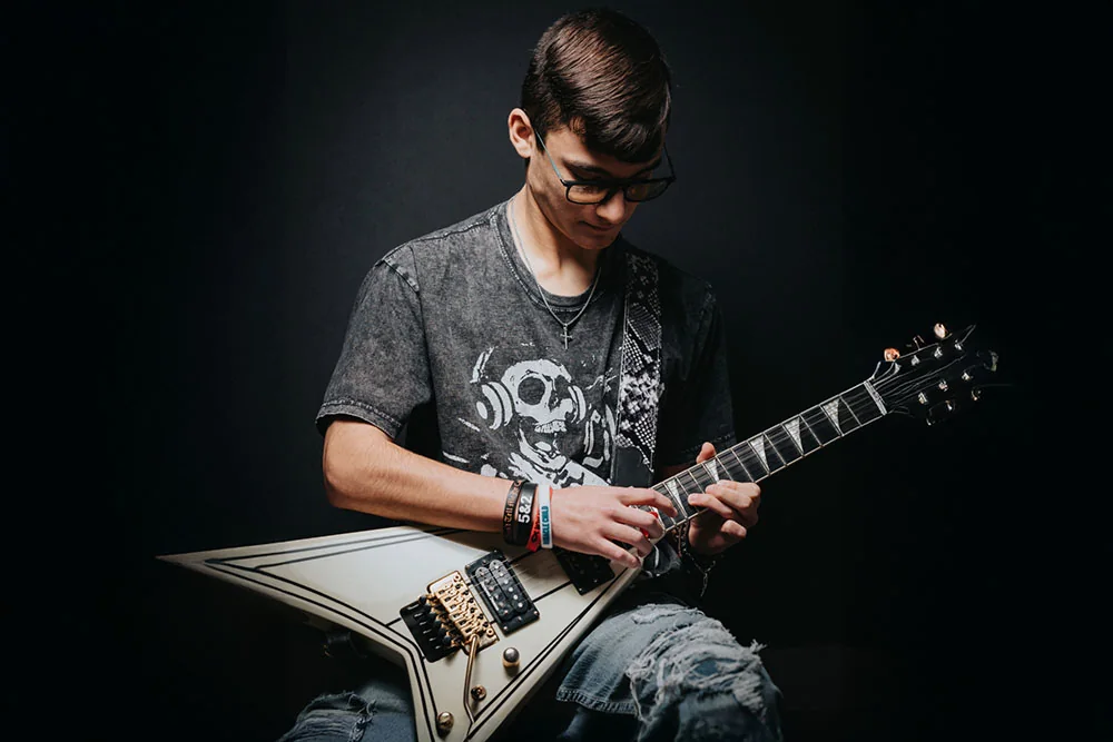 Best Lesson Ever guitar student playing electric guitar